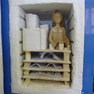 kiln loading with tiles, limoges and Nuala's sculptures